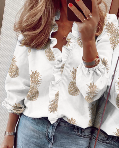 BLUSA ROMÁNTICA CON VOLANTES Y MANGAS LARGAS - ELEGANCIA ATEMPORAL