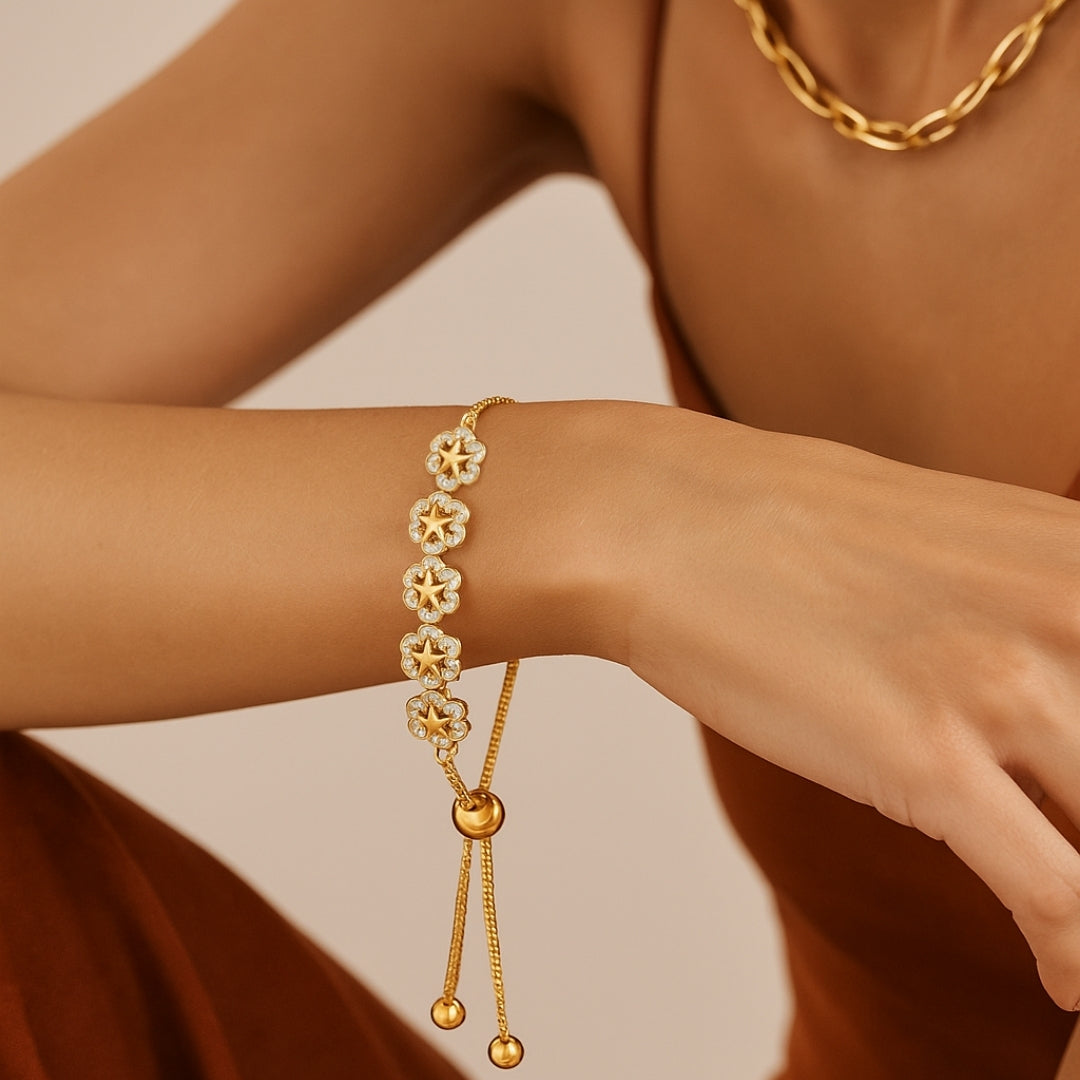 PULSERA VALENTINA ROCHE DORADA CON FLORES Y CIRCONITAS