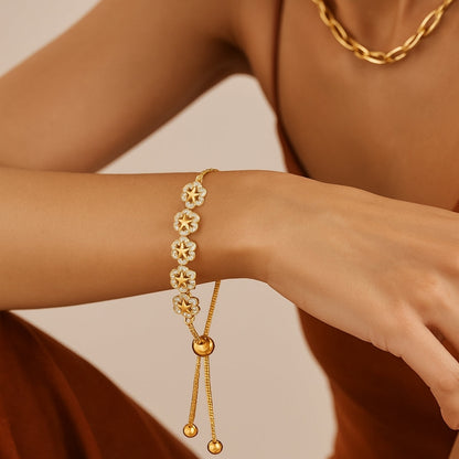 PULSERA VALENTINA ROCHE DORADA CON FLORES Y CIRCONITAS