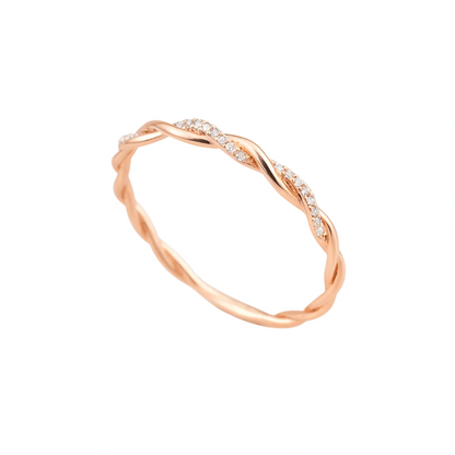 ANILLO VALENTINA ROCHE DORADO ROSADO TRENZADO CON CIRCONITAS