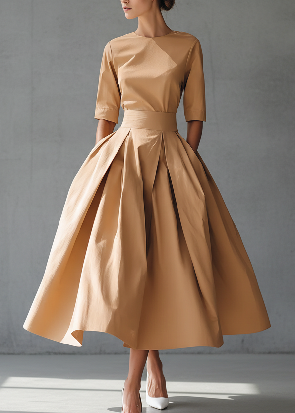 VESTIDO MIDI SATINADO CON FALDA DE VUELO Y CORTE ESTRUCTURADO