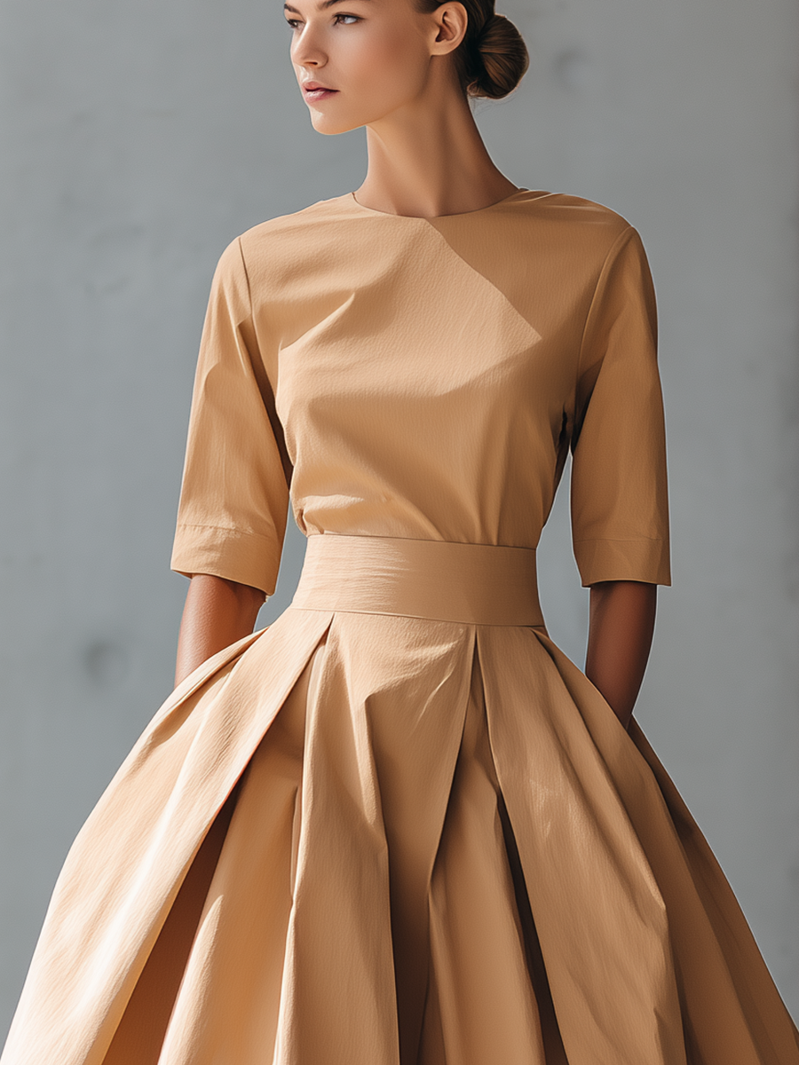 VESTIDO MIDI SATINADO CON FALDA DE VUELO Y CORTE ESTRUCTURADO