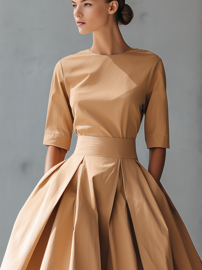 VESTIDO MIDI SATINADO CON FALDA DE VUELO Y CORTE ESTRUCTURADO