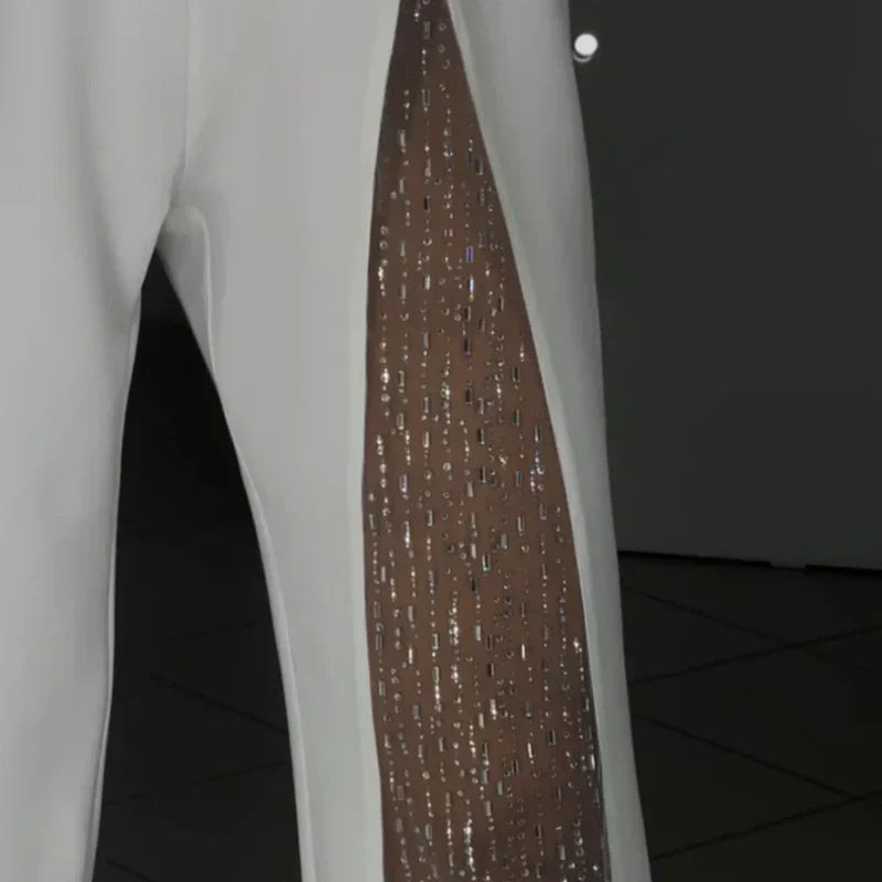 VESTIDO NEGRO DE FIESTA CON DETALLE TRANSPARENTE