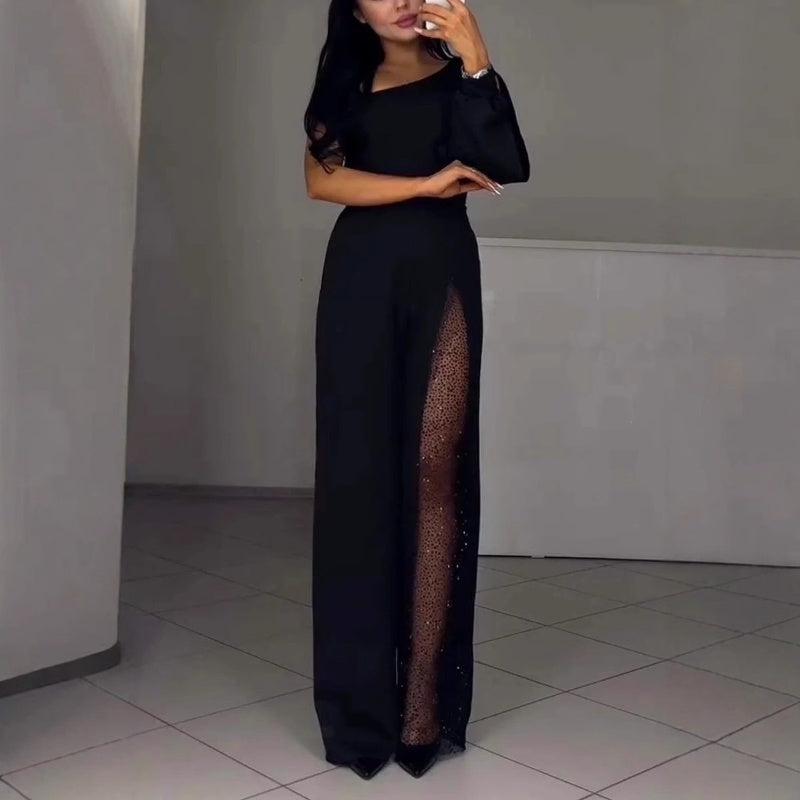 VESTIDO NEGRO DE FIESTA CON DETALLE TRANSPARENTE